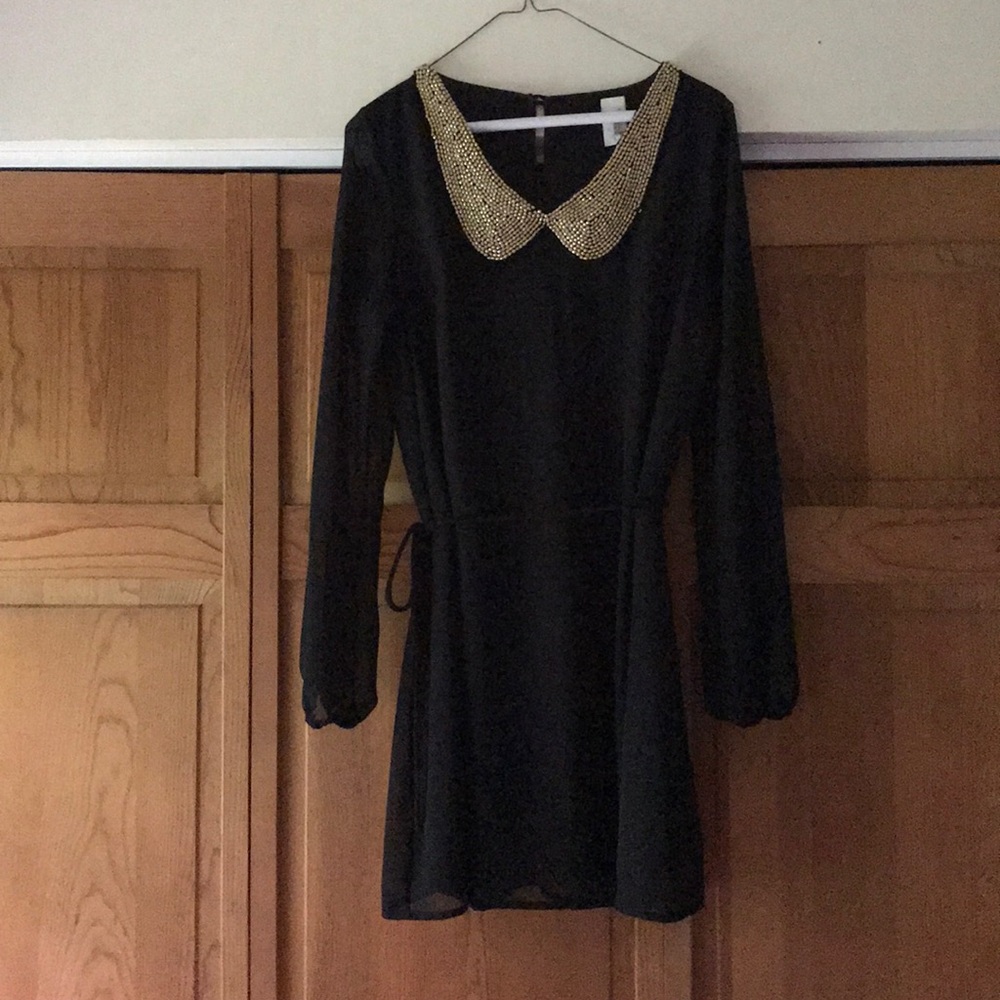 Black dress with gold beaded neckline